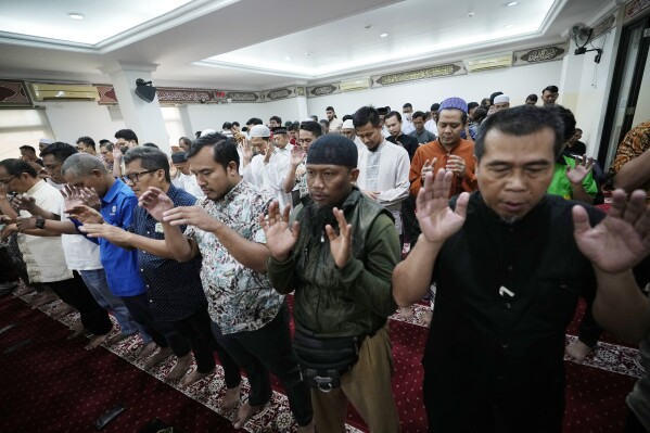 Indonesian Muslims pray for the safety of the Palestinian people during a Friday prayer at Abu Bakar Ashshiddiq Mosque in Jakarta, Indonesia, Friday, Oct. 13, 2023. As violence and tensions increase in the Gaza Strip with Israeli airstrikes after an unprecedented Hamas attack, Islamic leaders in Indonesia, the world's most populous Muslim-majority nation, appealed to all mosques across the country to pray for peace and safety for the Palestinian people. (AP Photo/Achmad Ibrahim)